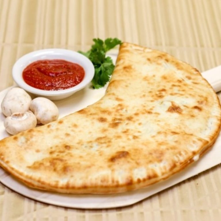 Savor Our Calzone Creations